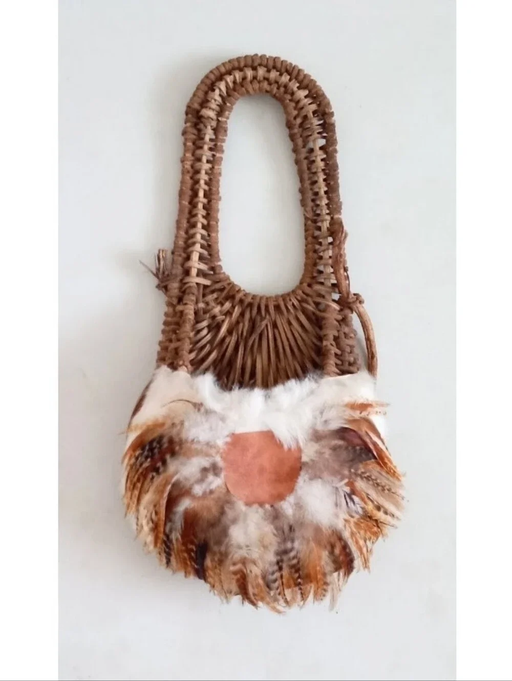 Indigenous Native American vintage natural wicker and feather wall basket